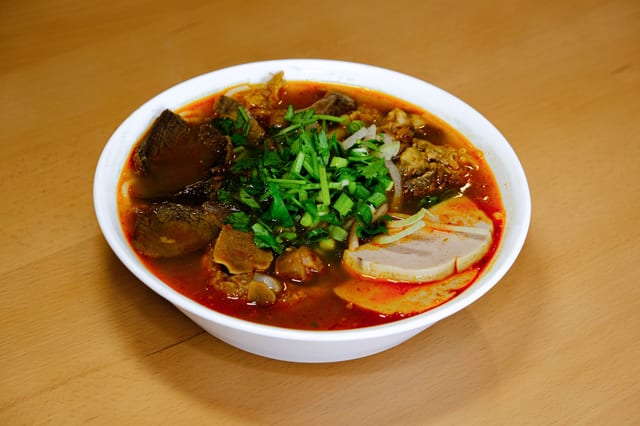 Bún Bò Huê - Spicy Beef & Pork Noodle Soup.